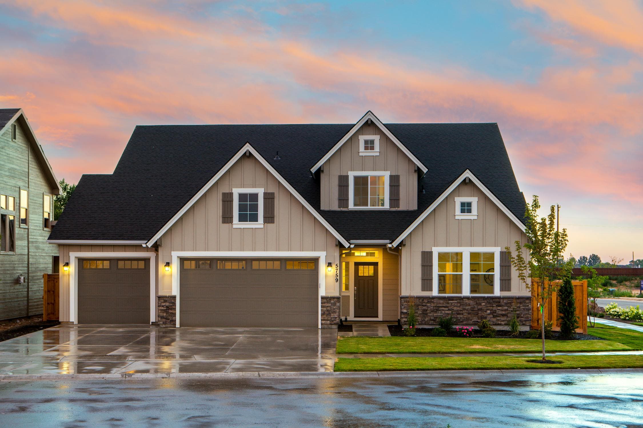Sacramento rental property exterior at dusk with warm LED roofline lighting illuminating the facade, demonstrating how permanent outdoor lights improve tenant appeal and security