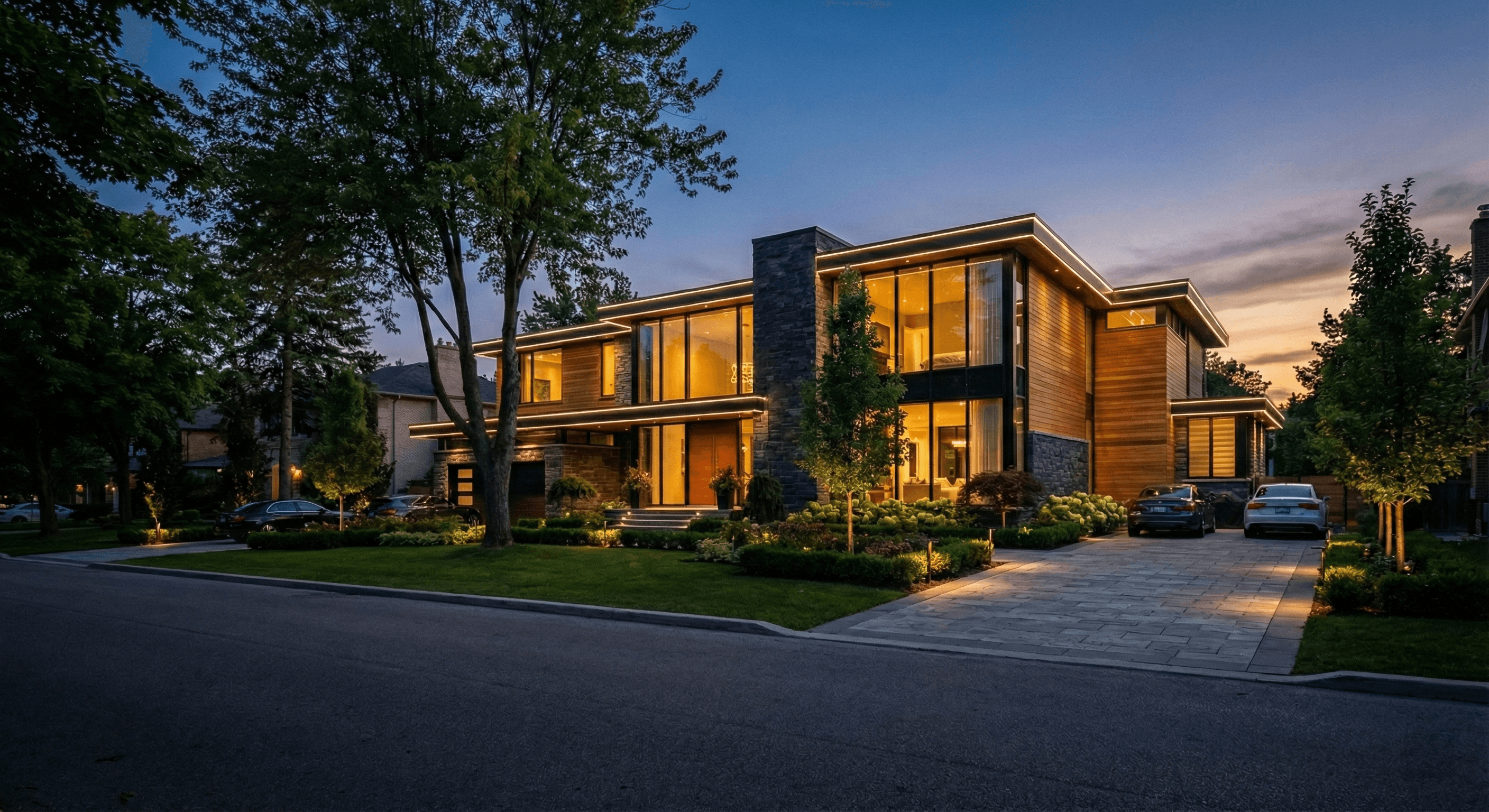 Same modern home with sleek white roofline accent lighting