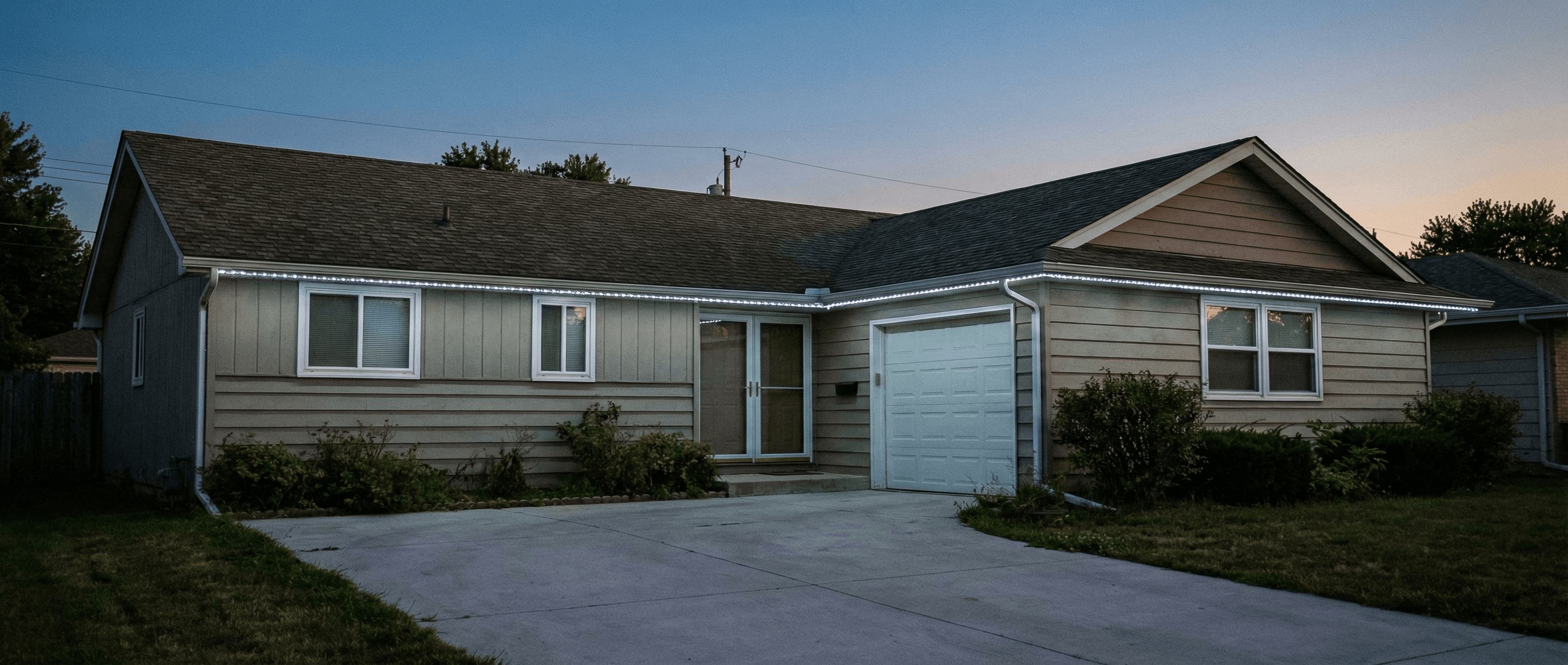 Ranch home exterior at twilight