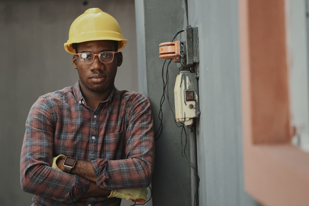 Sacramento home permanent outdoor LED lighting controller wired into a battery backup circuit, showing the smart controller, circuit panel sub-feed, and battery backup unit homeowners use to keep roofline lights on during PG&E PSPS power outages